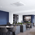 Air conditioning unit installed in a contemporary office environment.